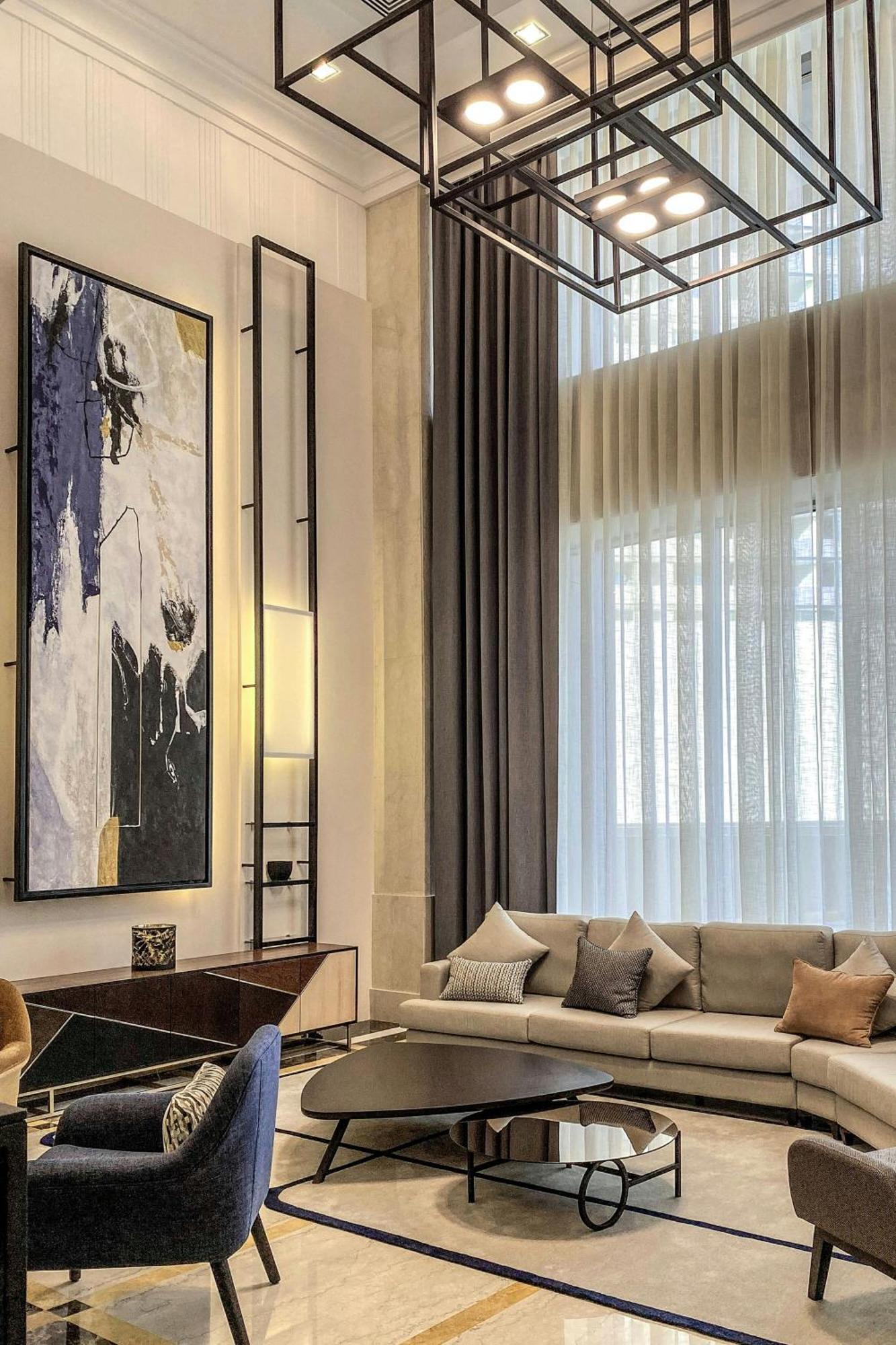 Marriott Executive Apartments Manama, Bahrain Zewnętrze zdjęcie A living room with a sheer curtain